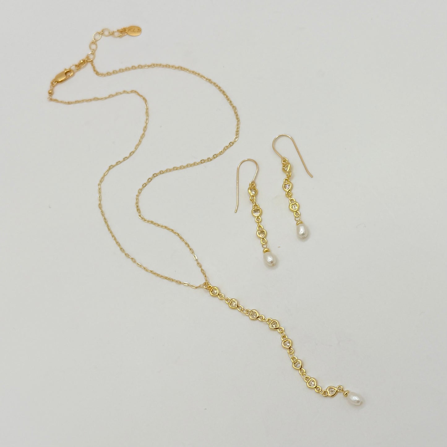 Gold Heart Zircon Lariat Necklace with Freshwater Pearl by Flying Lizard Design