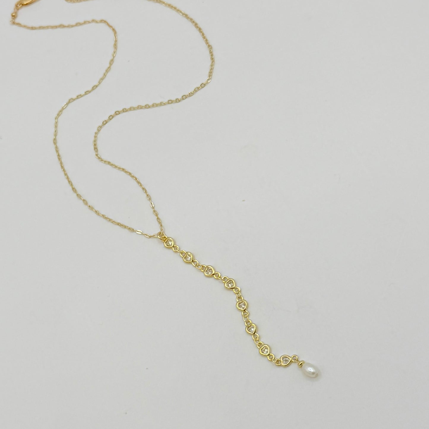 Gold Heart Zircon Lariat Necklace with Freshwater Pearl by Flying Lizard Design
