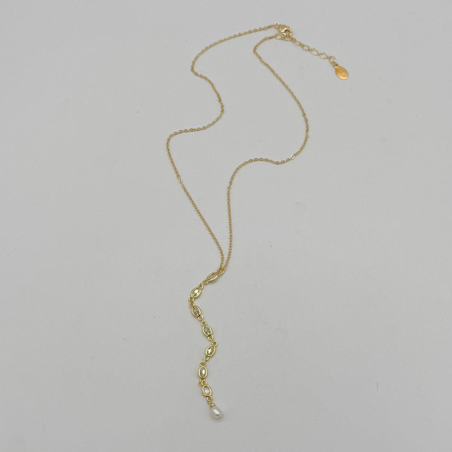 Gold Heart Zircon Lariat Necklace with Freshwater Pearl by Flying Lizard Design